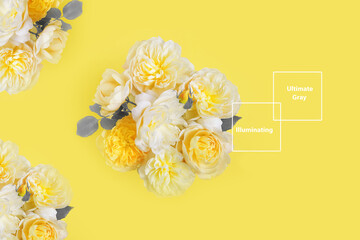 Festive flower composition on the yellow background. Overhead view