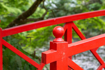 Close up of red japanese garden bridge