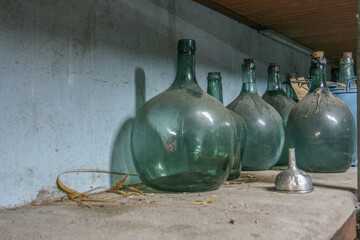 A large glass carafe called Damajuana and used to bottle wine