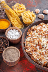 top view cooked rice along with seasonings on dark background food dish photo