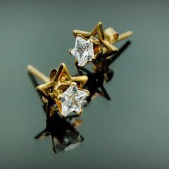 A pair of Gold Earrings with Star Studs