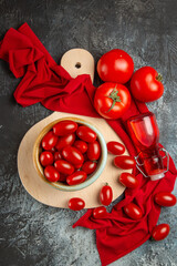 Fototapeta na wymiar top view fresh tomatoes on light-dark background health salad food diet