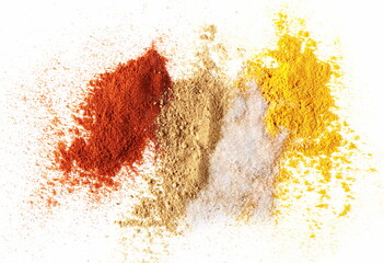 Pile of red paprika, ginger, salt and turmeric (Curcuma) powder isolated on white background, top...
