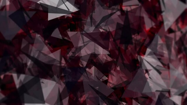 Dynamic pattern closeup background of red white black polygons which look like mirrors sparkle like a ruby turn in chaotic manner at the same time the camera moves to the right on dark background.