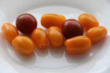 Fresh cherry tomatoes. Various colorful tomatoes	
