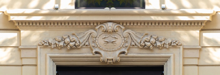 On the streets in Barcelona, public places. Elements of architectural decoration of buildings, plaster stucco, wall texture, plaster molding and patterns.  © Kozlik_mozlik