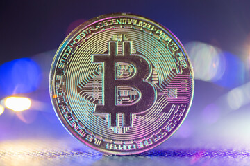Golden bitcoin cryptocurrency with high value against fiat currency and profitable mining. Digital...