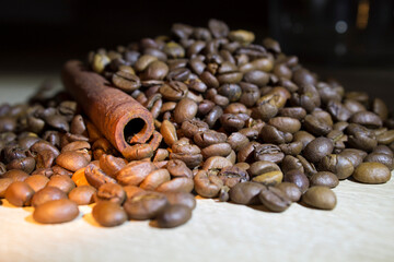coffee beans with cinnamon on the table