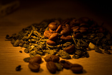 dried green tea leaves and coffee beans