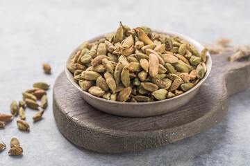 Green aromatic cardamom pods.