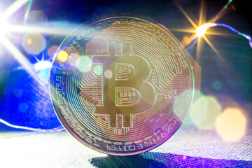 Golden bitcoin cryptocurrency with high value against fiat currency and profitable mining. Digital...