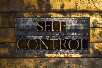 Self Control text on grunge textured copper and gold background