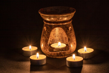 Aromatic lamp with burning candles