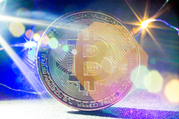 Golden bitcoin cryptocurrency with high value against fiat currency and profitable mining. Digital...