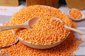 orange lentils in wooden bowl. Healthy lifestyle. Vegetarian and vegan diet.