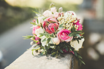 Beautiful wedding bouquet with different flowers, roses