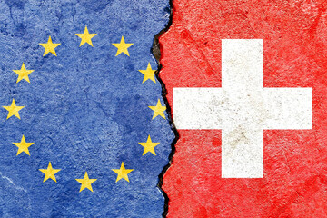 EU and Swis flag on a cracked wall-politics, war, conflict concept