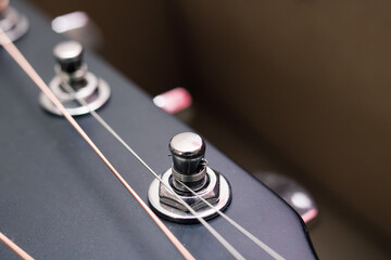 Black and yellow guitar strings closeup macro photography