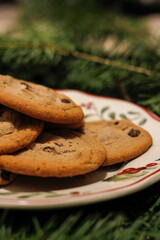 Chocolate chip cookies on vintage Christmas plate.