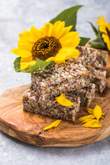 Kozinaki with seeds, nuts, with honey. Useful snacks. Fitness nutrition, nutritious snack, energy bar.