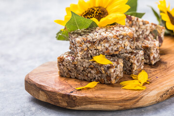 Kozinaki with seeds, nuts, with honey. Useful snacks. Fitness nutrition, nutritious snack, energy bar.