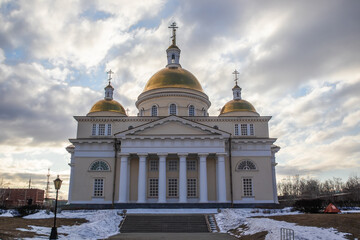Orthodox church in winter under a cloudy sky