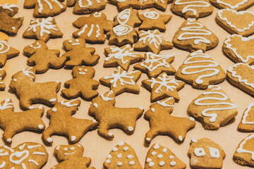 Christmas homemade gingerbread cookies on wooden table