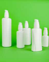 group of white cosmetic plastic bottle