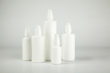 group of white cosmetic plastic bottle