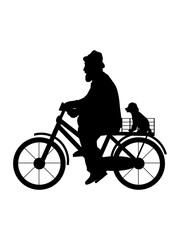 Obraz premium Silhouette senior man grandfather is riding bicycle with dog.