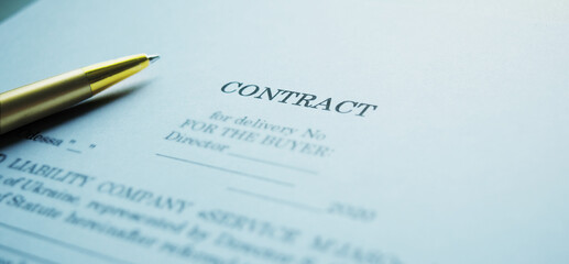 Business contract and pen on the table. Business and finance concept. Selective focus.