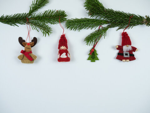 Christmas composition. Christmas decoration and fir tree branches on white background. Flat lay, top view.