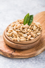 Peanuts in shell texture background. Raw peanuts on display at a farmer's market. unpeeled peanut background