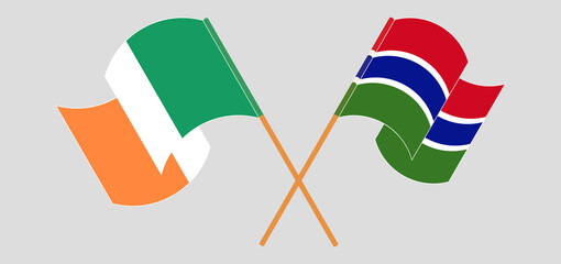 Crossed and waving flags of Ireland and the Gambia
