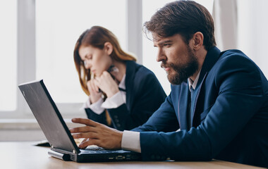 Business man and woman working desk technology internet communication finance office