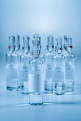 Ampoules with medicine close-up. Health care and medicine concept