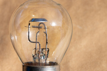 Close-up of filament H4 halogen car bulb.