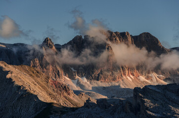 View of Dolomite mountains around Puez refuge at sunset golden hours in Puez-Odle Nature park,...