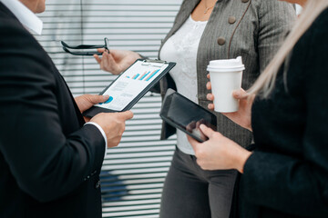close up. financial partners shaking hands in the office.