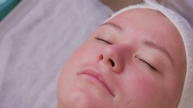 Skin Care. Beautiful Healthy Woman Getting Her Skin Analized By Cosmetologist, Using Skin Analyzer Professional Beauty Equipment For Face Skin Analysis At Cosmetology Center.