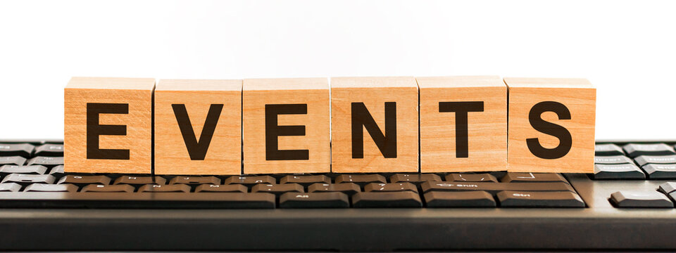 events - word made with building blocks in the black keyboard