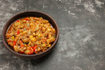 top view roasted eggplant salad in bowl on dark background free place