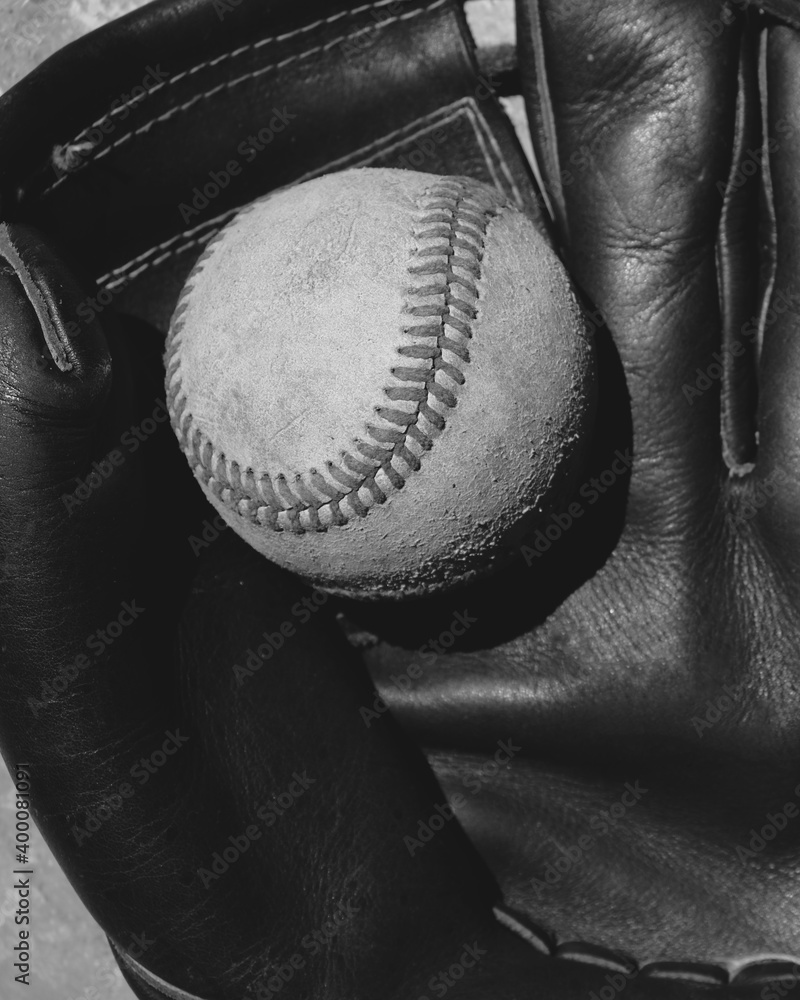 Poster baseball in leather glove shows old texture of sports equipment in black and white. - Posters
