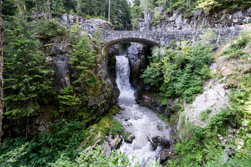 Christine Falls in Mt Rainier National Park is a waterfall with a picturesque bridge