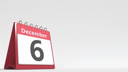 December 6 date on the flip desk calendar page, blank space for user text, 3d animation