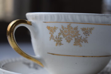 Tea hour, drinking tea, cup of tea with teapot