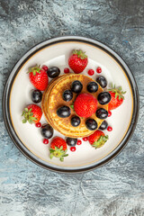 top view delicious pancakes with fruits and berries on a dark background cake fruit dessert