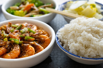 angle view fast food shrimp with cauliflowers and mushrooms and cabbage and rice horizontal composition