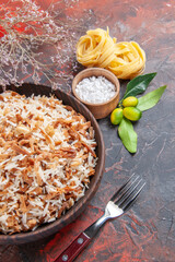 top view cooked rice with dough slices on a dark background dark meal dish food photo