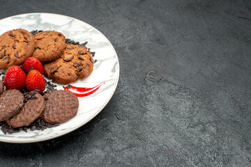 front view yummy choco biscuits for tea inside plate on dark background sweet cookie cake